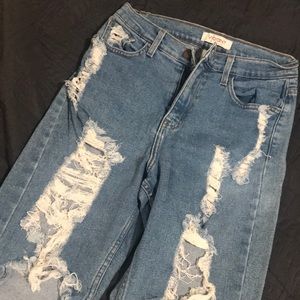 Distressed blue jeans